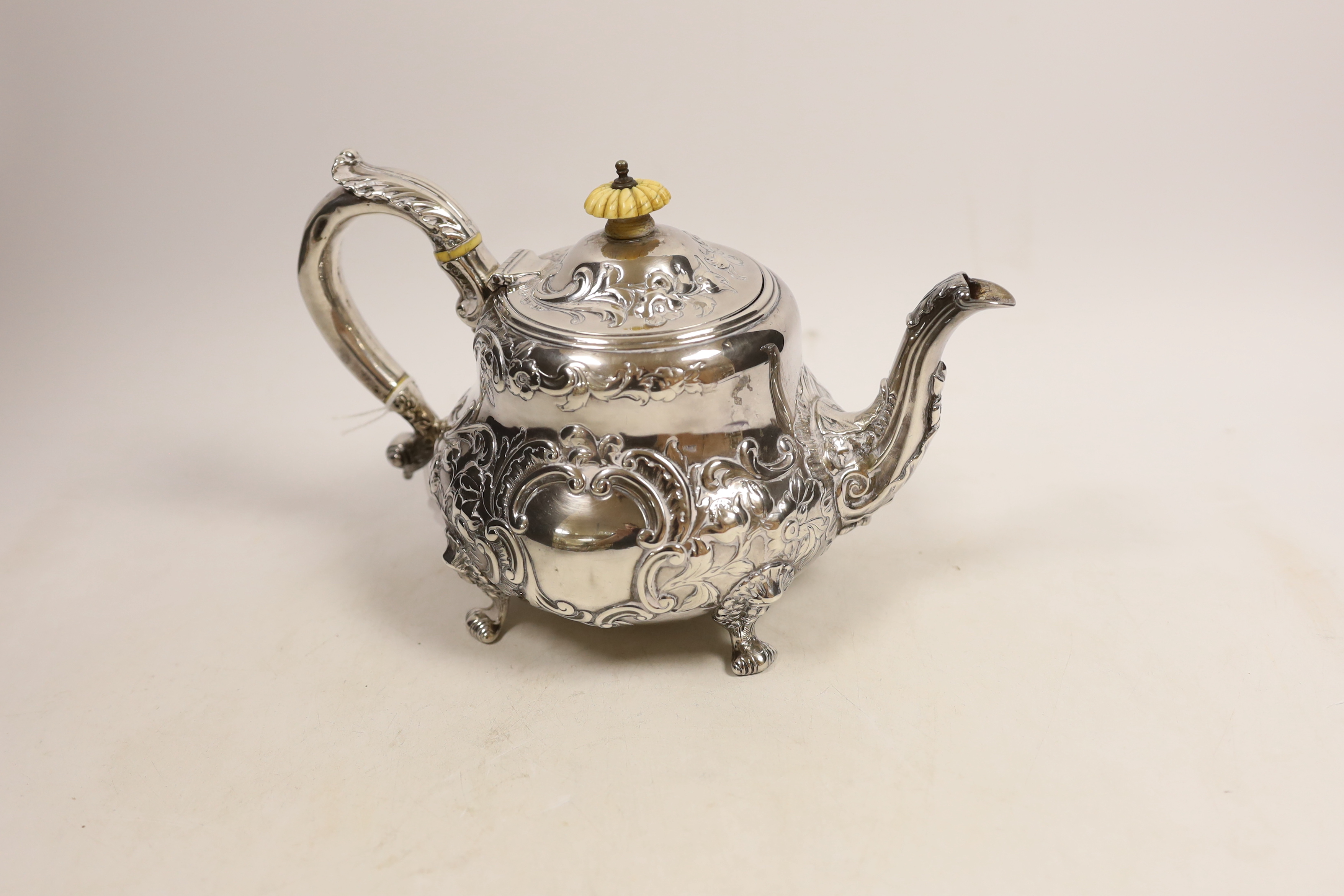 An early Victorian embossed silver teapot, Robert Hennell III, London, 1843, gross weight 22.2oz. CITES Submission reference XJSNPB34